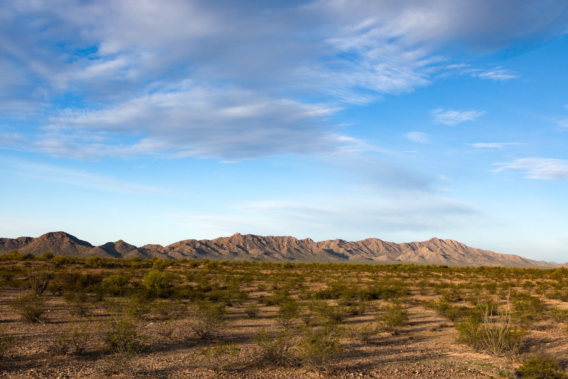 Bright sky distant mountains