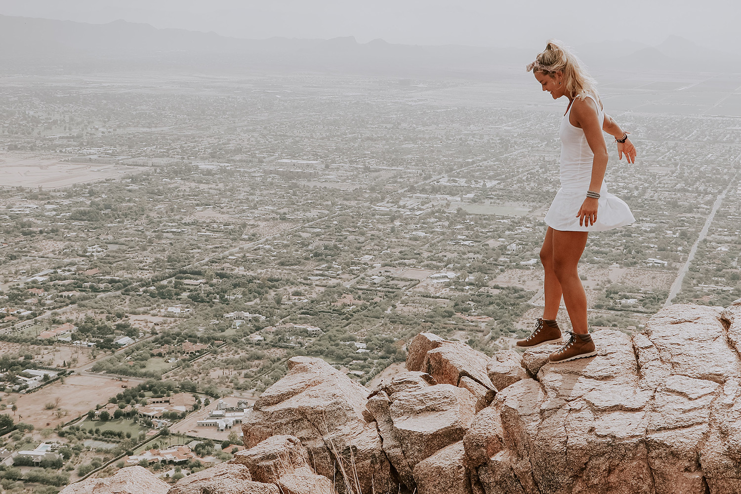 Woman walking on a cliff in Arizona